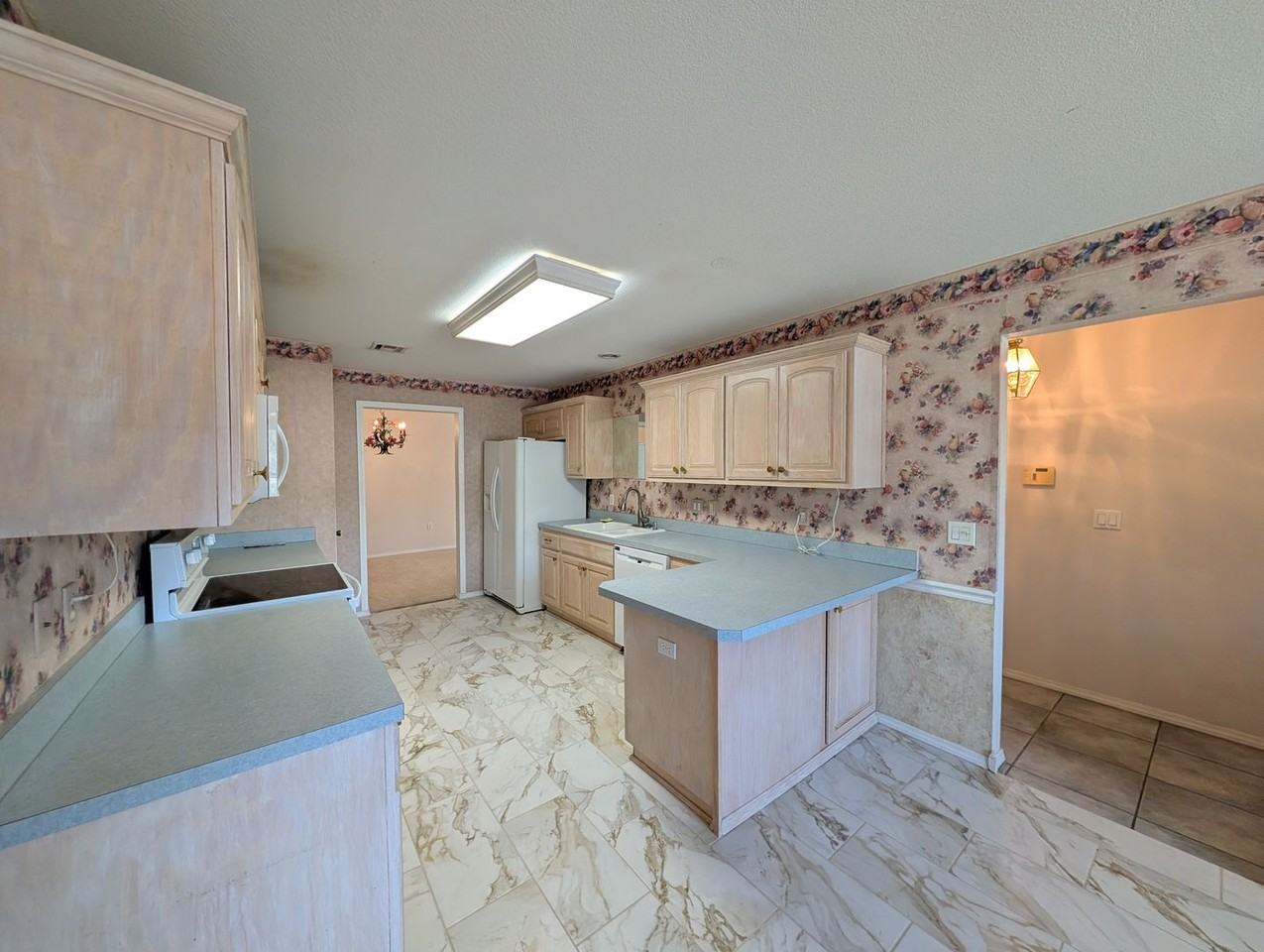 6947 E 46th Pl - Photo 4 of 26