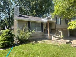 featured image of 2409 Ne Carousel Cir