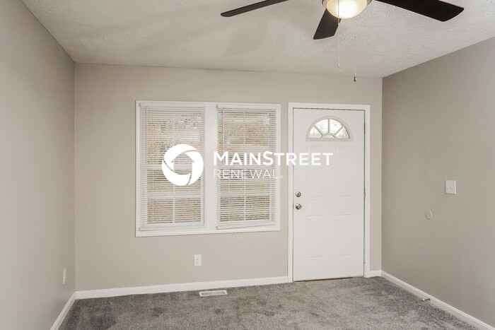 5020 Wellsworth Ave - Photo 5 of 16