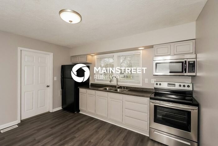 5020 Wellsworth Ave - Photo 7 of 16