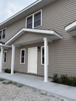 featured image of 102 W 7th St