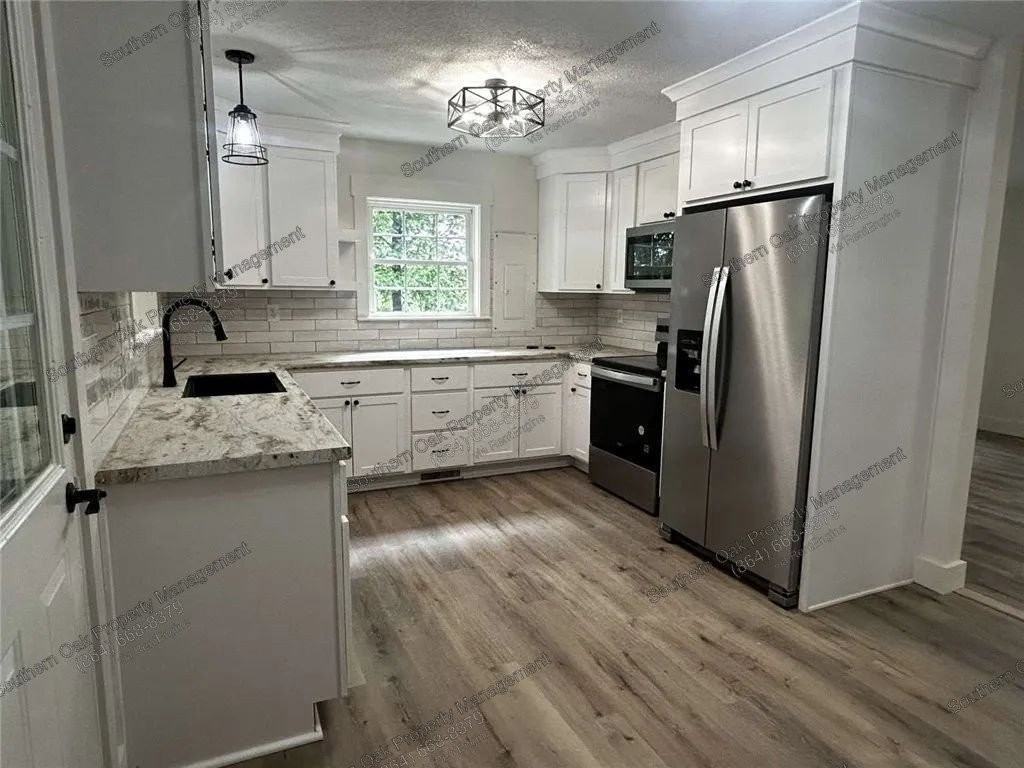 107 Ledbetter Ln - Photo 4 of 18
