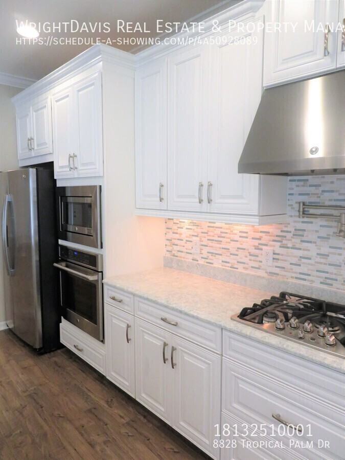 8828 Tropical Palm Dr - Photo 6 of 29