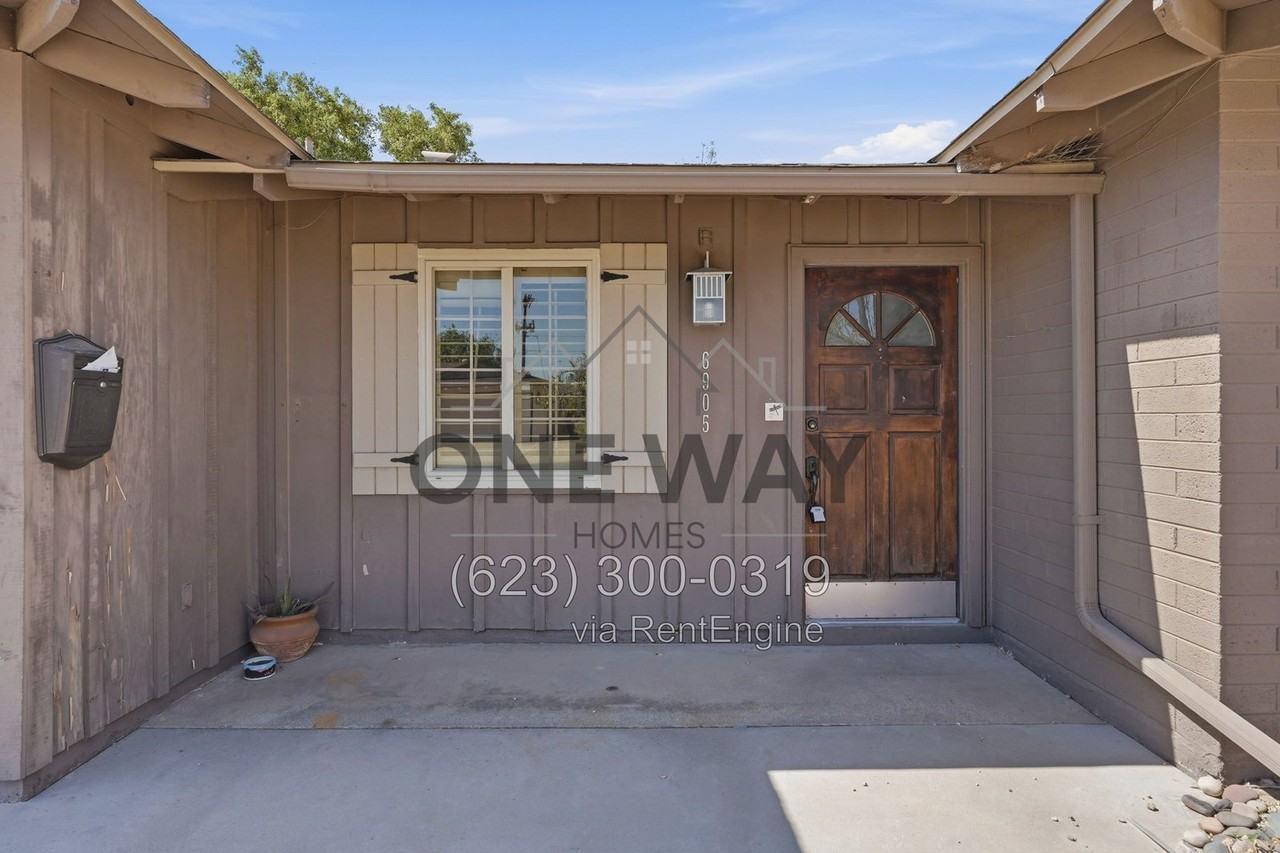 6905 E Hubbell St - Photo 4 of 40