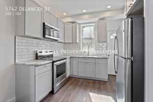 5742 Delancey St - Photo 1 of 1