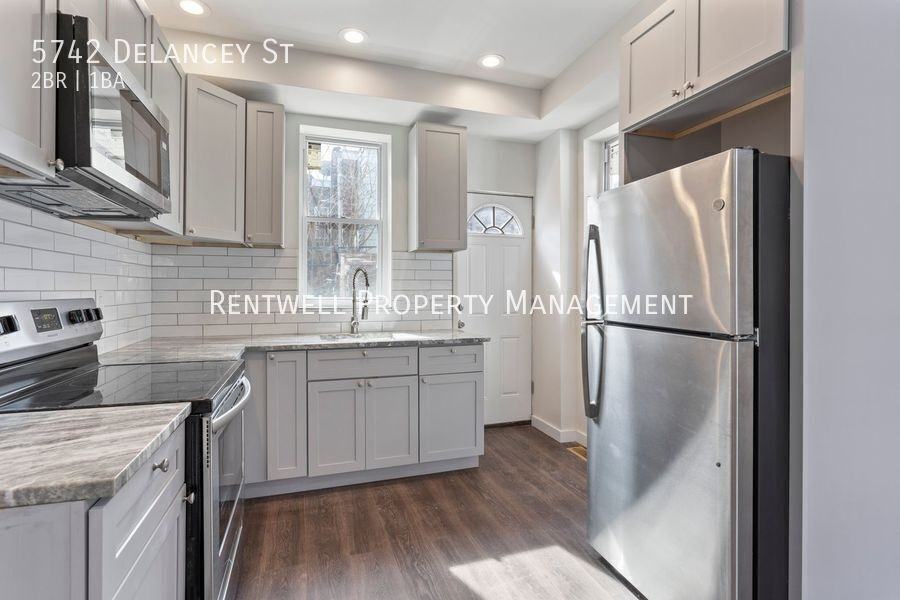 5742 Delancey St - Photo 7 of 16