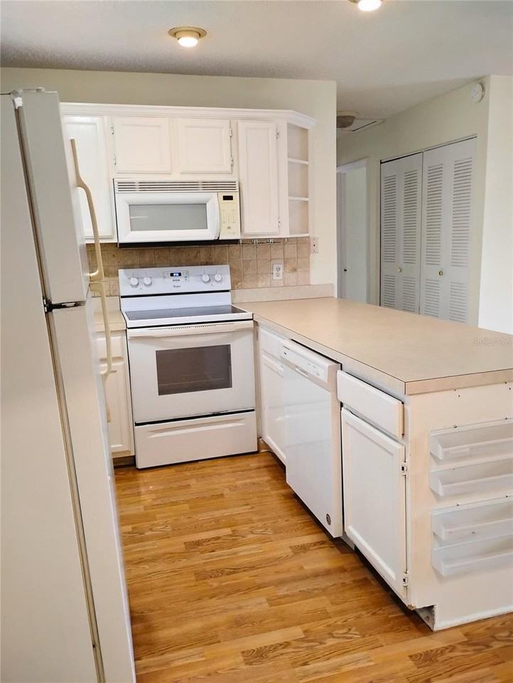 4973 91st Ave N #12 - Photo 4 of 19