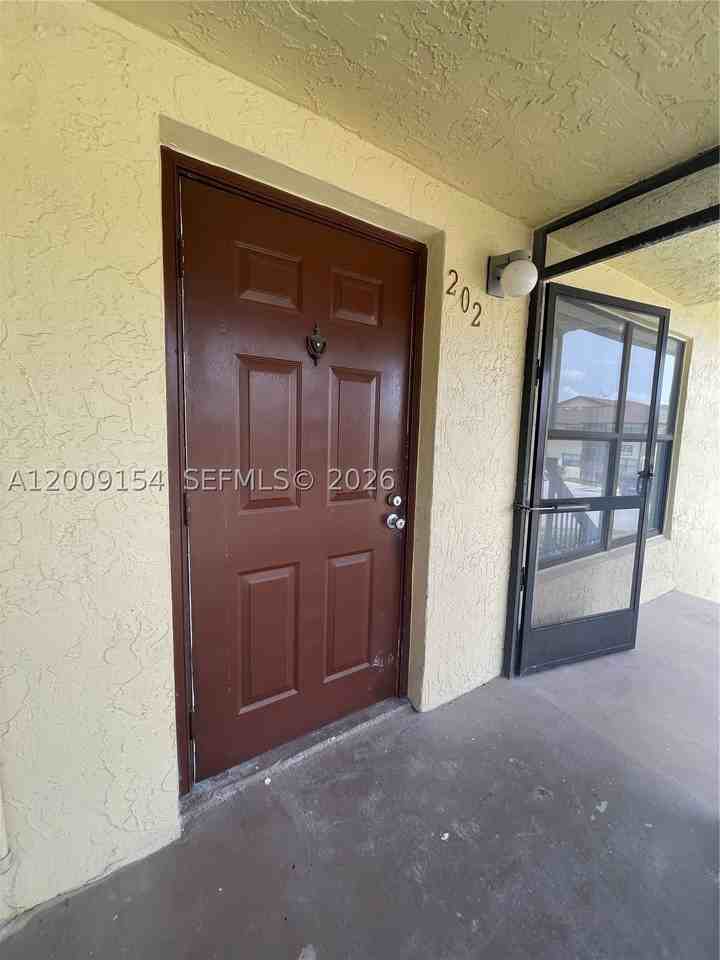 10016 Winding Lake Rd #202 - Photo 4 of 23