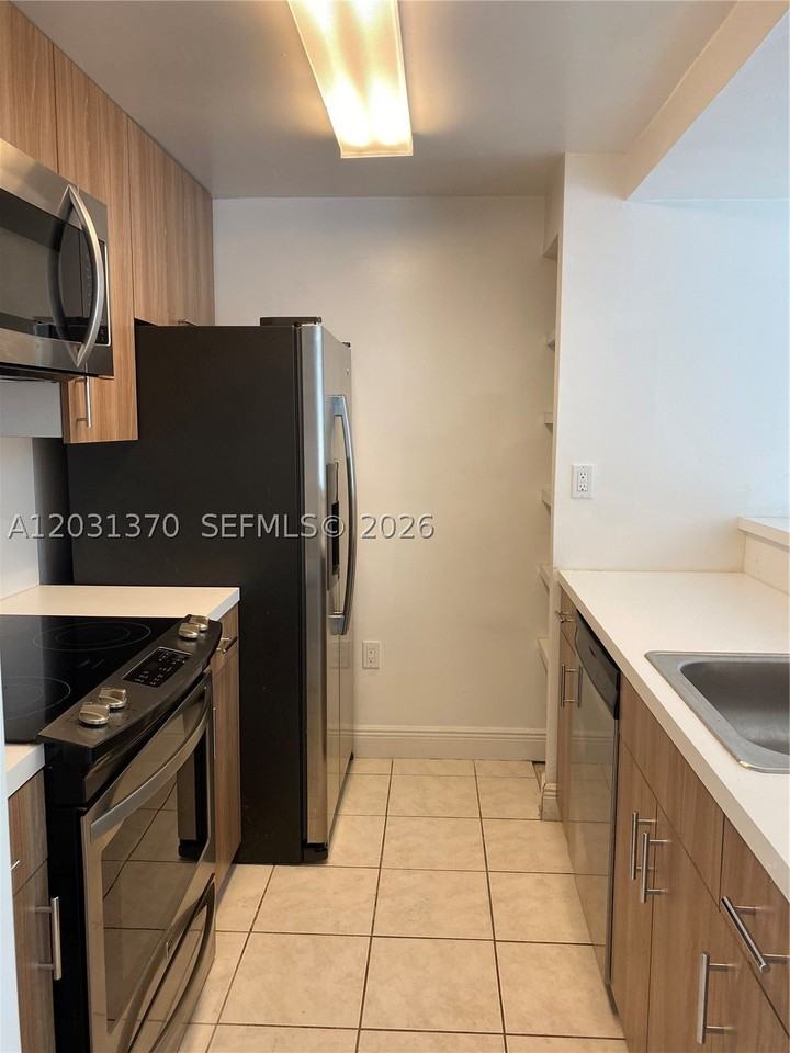 7075 Nw 186th St #C308 - Photo 4 of 31