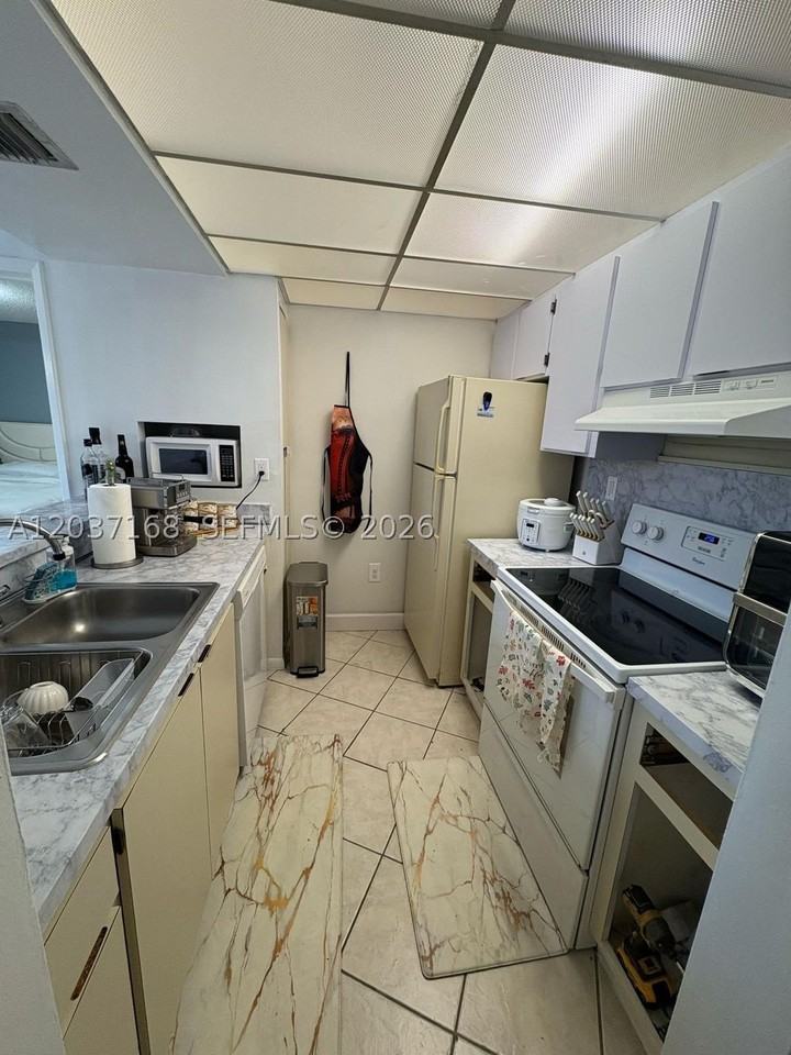 7035 Nw 186th St #D302 - Photo 4 of 9