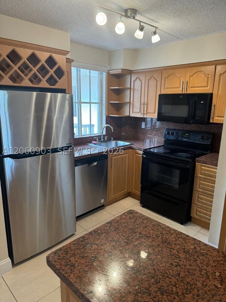 6045 Nw 186th St #309 - Photo 5 of 12