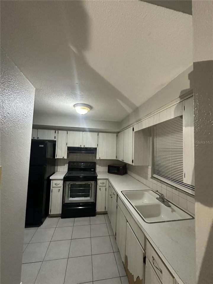 5509 Riddle Rd - Photo 5 of 13