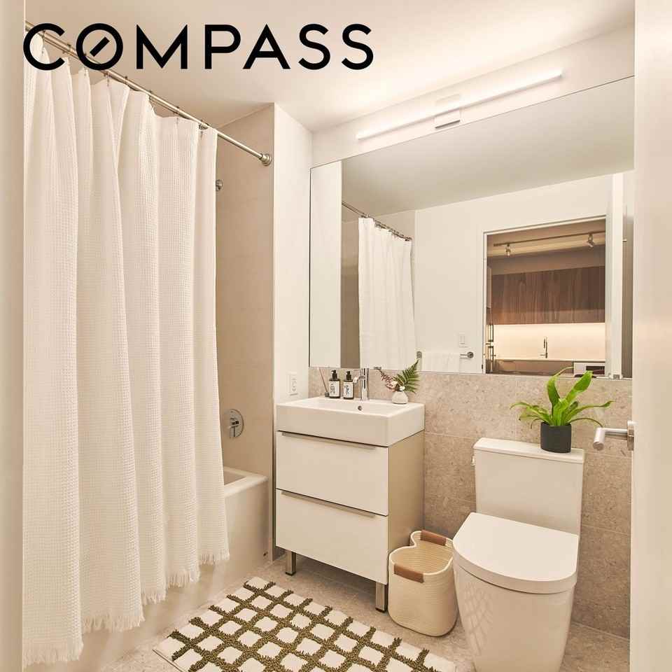 3077 Vernon Blvd - Photo 5 of 10