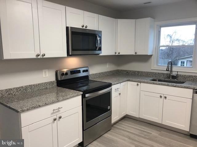 9104 Cooper Dr - Photo 4 of 28