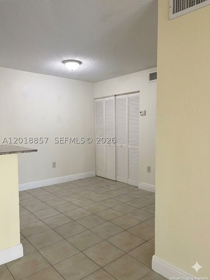 7115 Nw 179th St #106 - Photo 2 of 13