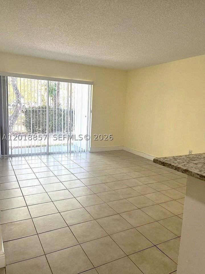 7115 Nw 179th St #106 - Photo 3 of 13