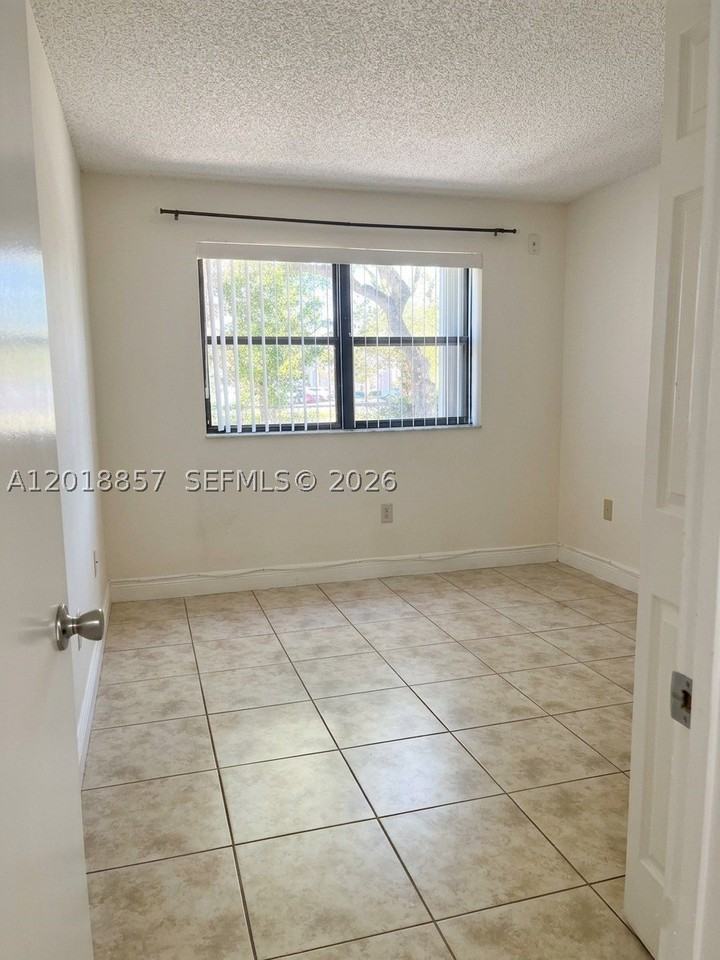 7115 Nw 179th St #106 - Photo 4 of 13