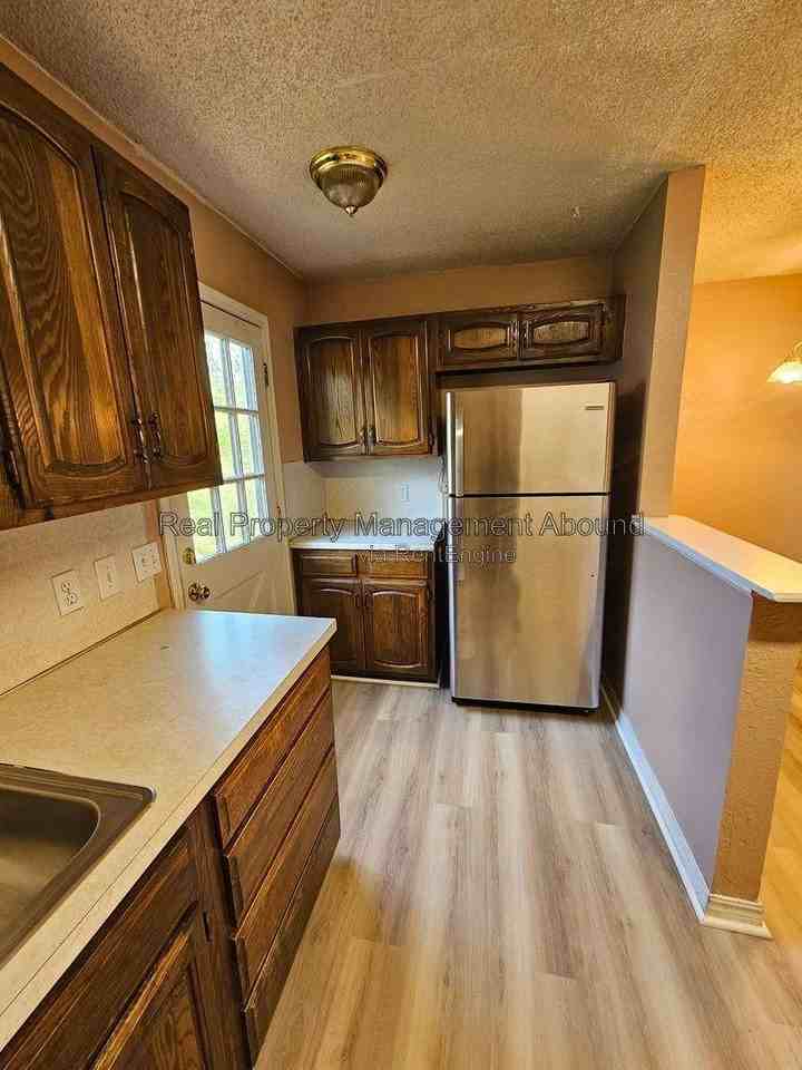 8011 N 117th East Ave - Photo 2 of 10