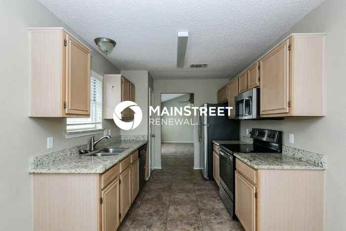 7128 Wagonwheel Rd - Photo 6 of 16