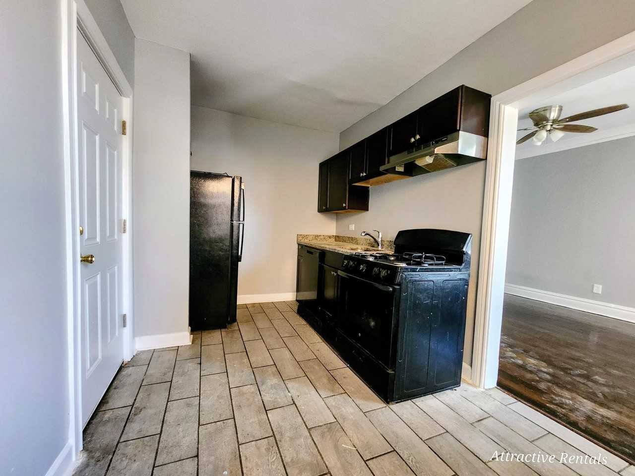 6055 S Troy St #2 - Photo 3 of 12
