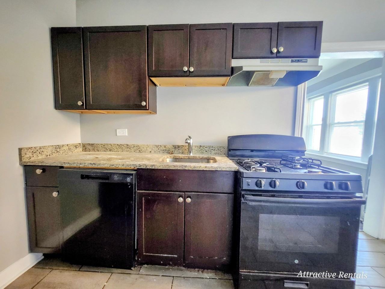 6055 S Troy St #2 - Photo 5 of 12