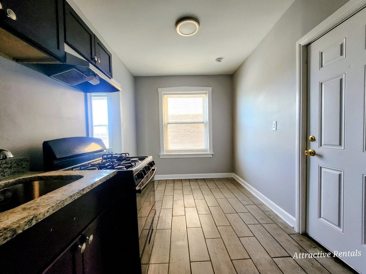 6055 S Troy St #2 - Photo 6 of 12