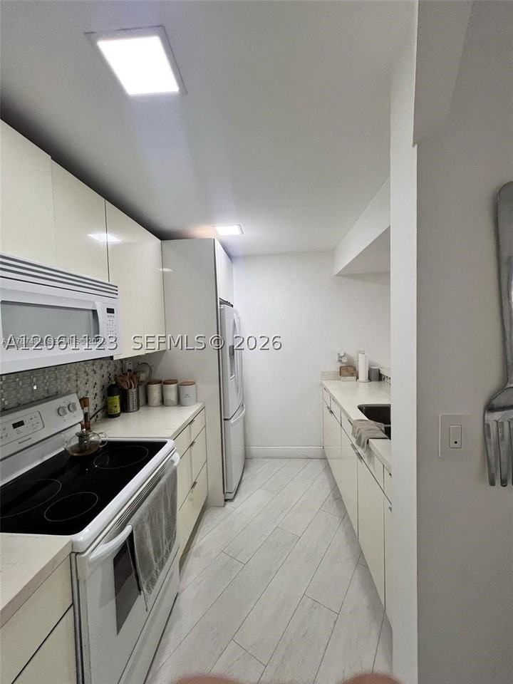 6955 Nw 186th St #F104 - Photo 6 of 14