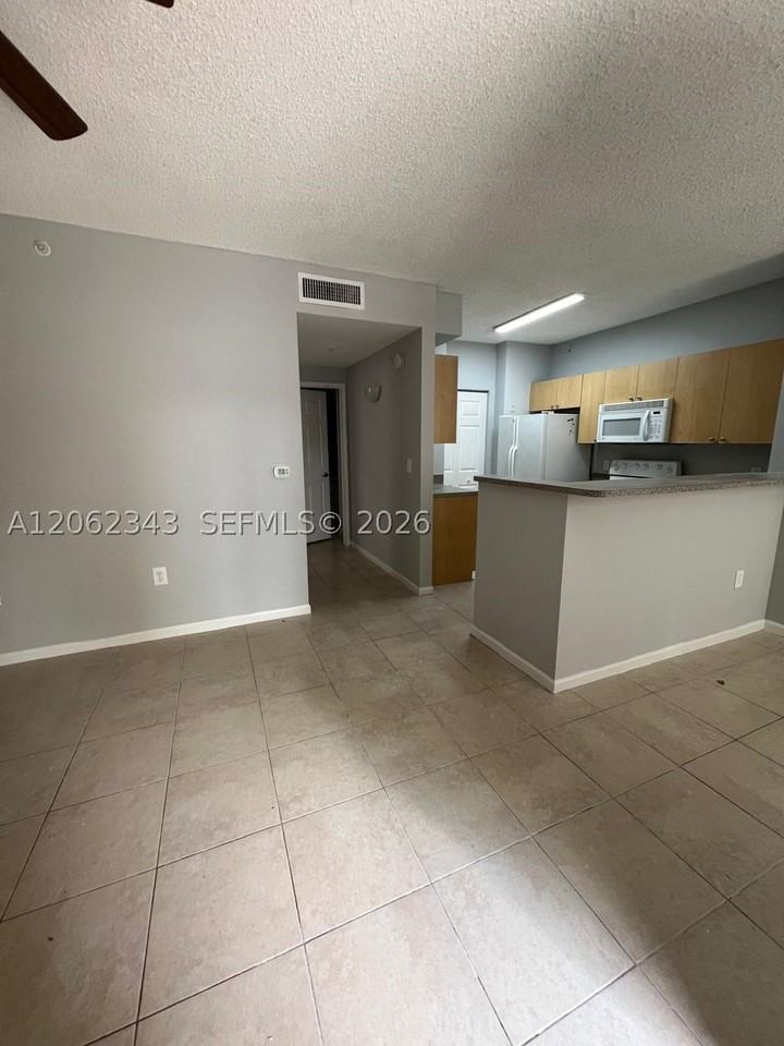 8020 N Nob Hill Rd #102 - Photo 2 of 9