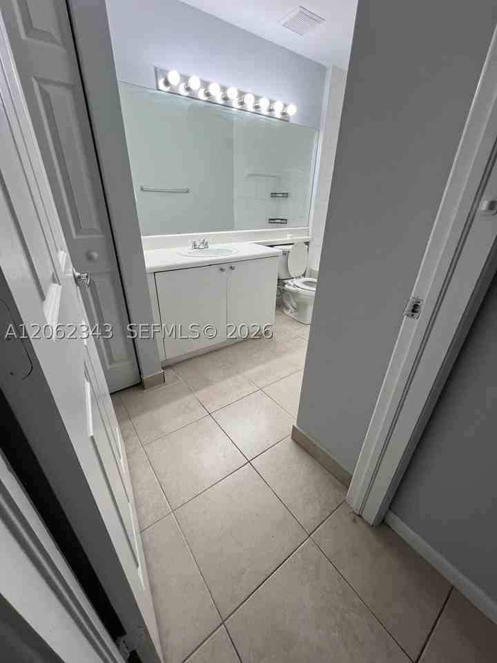 8020 N Nob Hill Rd #102 - Photo 7 of 9