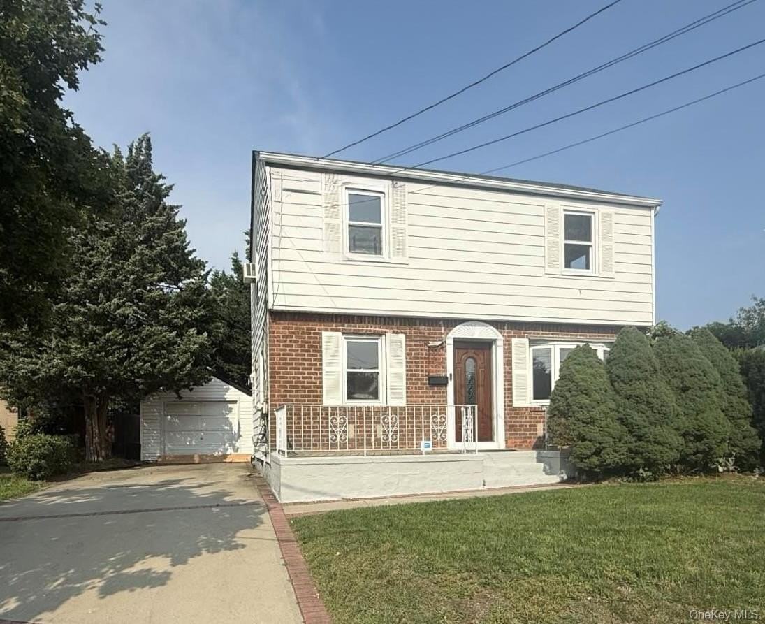 410 Herricks Rd - Photo 2 of 19