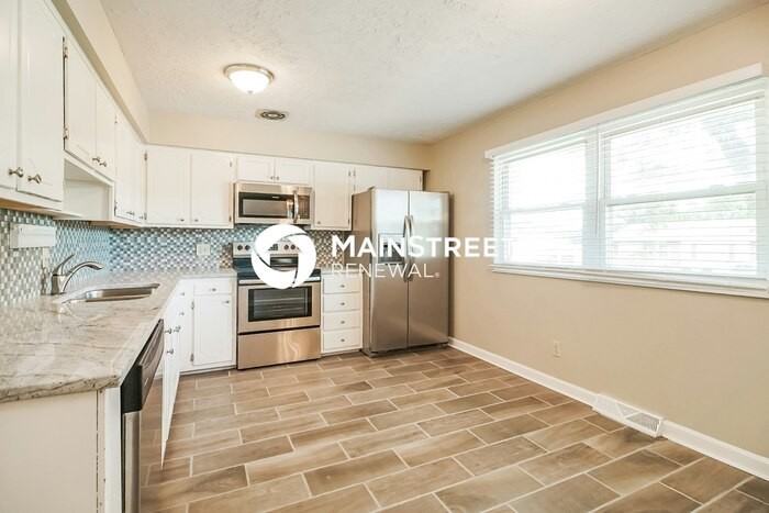 6259 Faircrest Rd - Photo 5 of 17