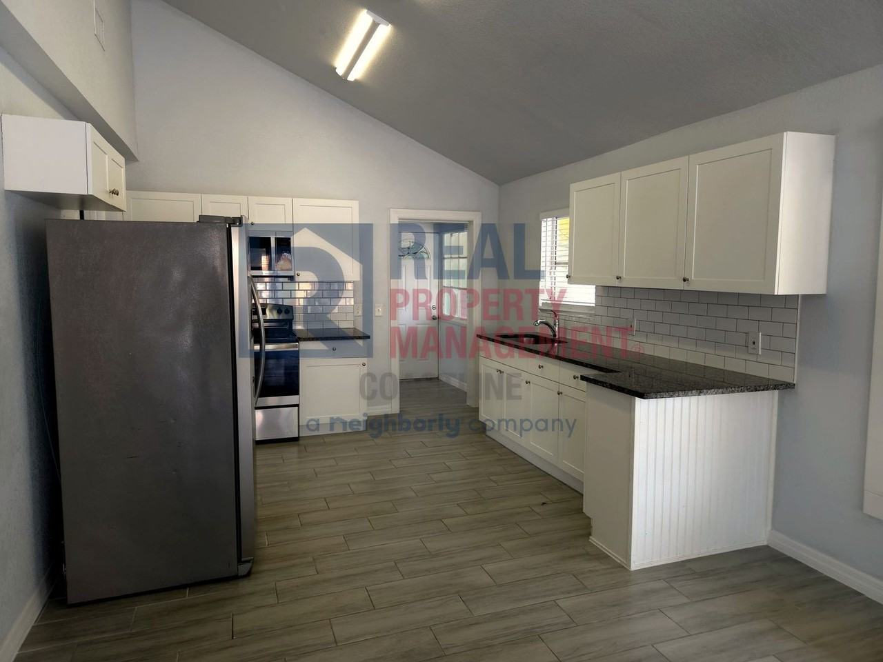1415 10th St W - Photo 5 of 27