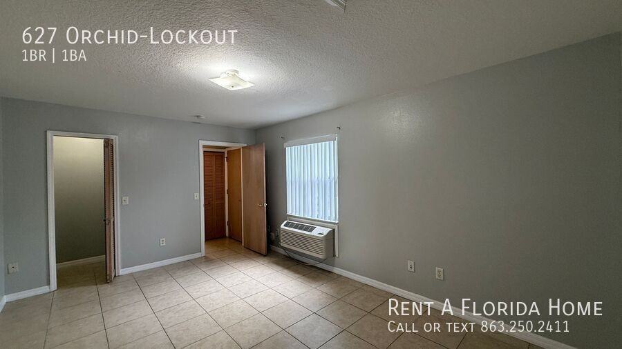 ORCHID-LOCKOUT & - Photo 5 of 12