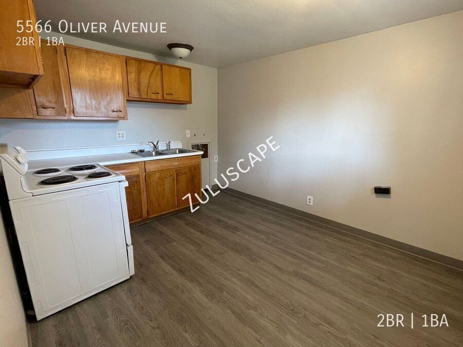 5566 Oliver Ave - Photo 3 of 7