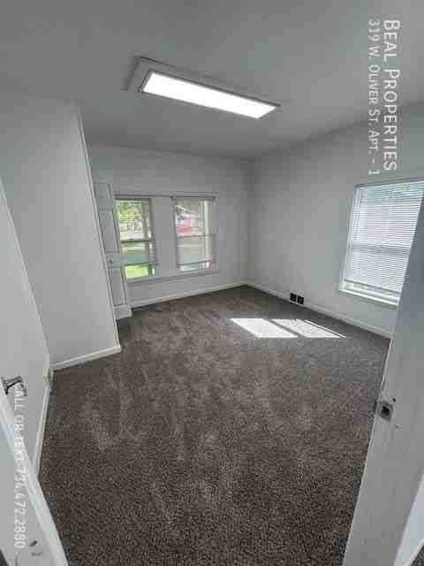 319 W Oliver St #1 - Photo 4 of 7