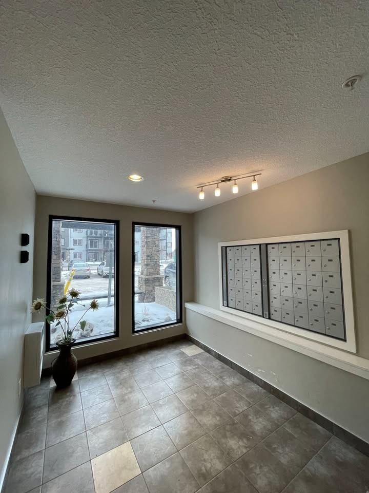 3357 16a Ave Nw #215 - Photo 2 of 9
