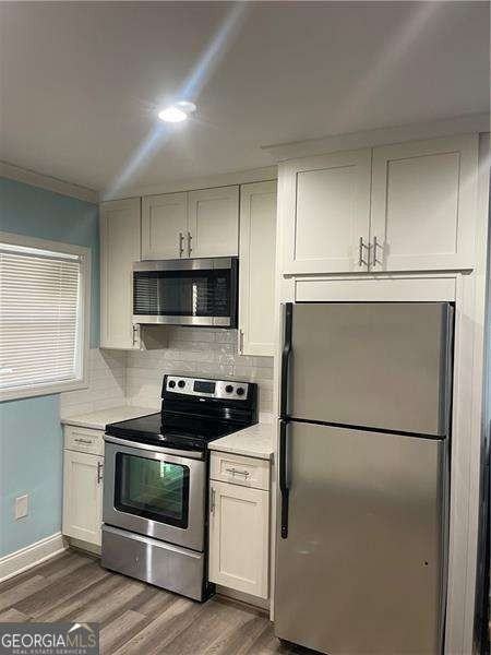 3168 Sewell Mill Rd - Photo 2 of 9