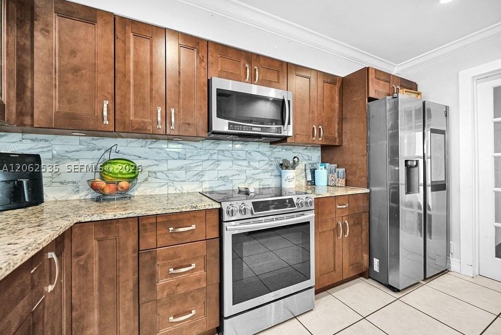 740 N 73rd Ave - Photo 6 of 50