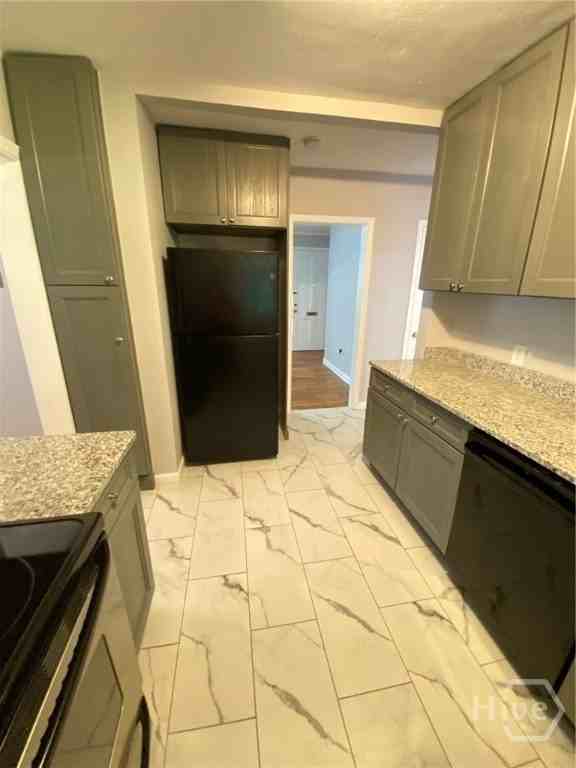 2219 E 40th St - Photo 6 of 13