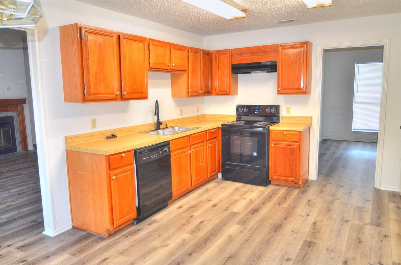 8901 Greentree Dr - Photo 2 of 11