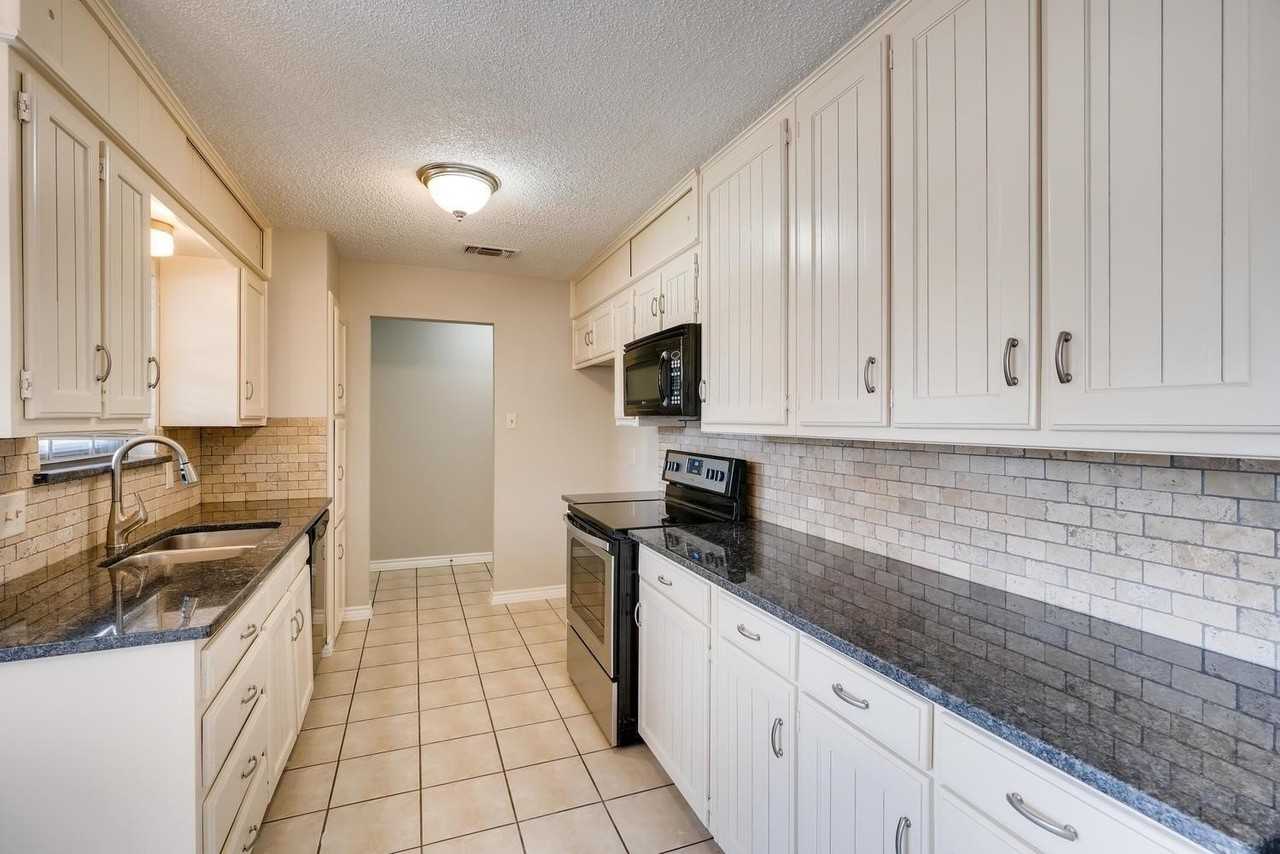 5912 Woodmeadow Dr - Photo 2 of 13
