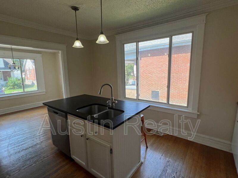 6565 Arsenal St - Photo 4 of 15