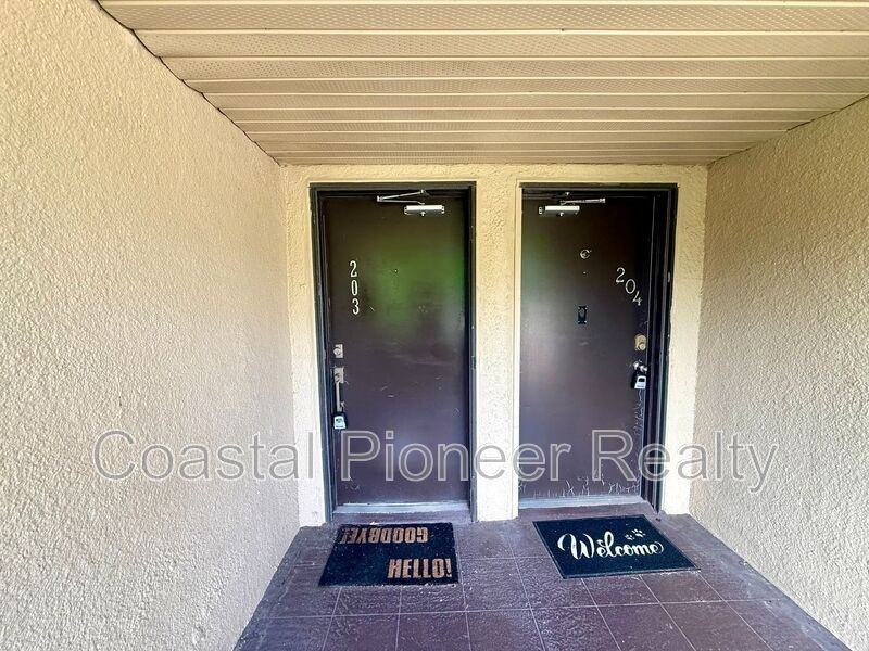 10775 Village Club Cir N #203 - Photo 2 of 23
