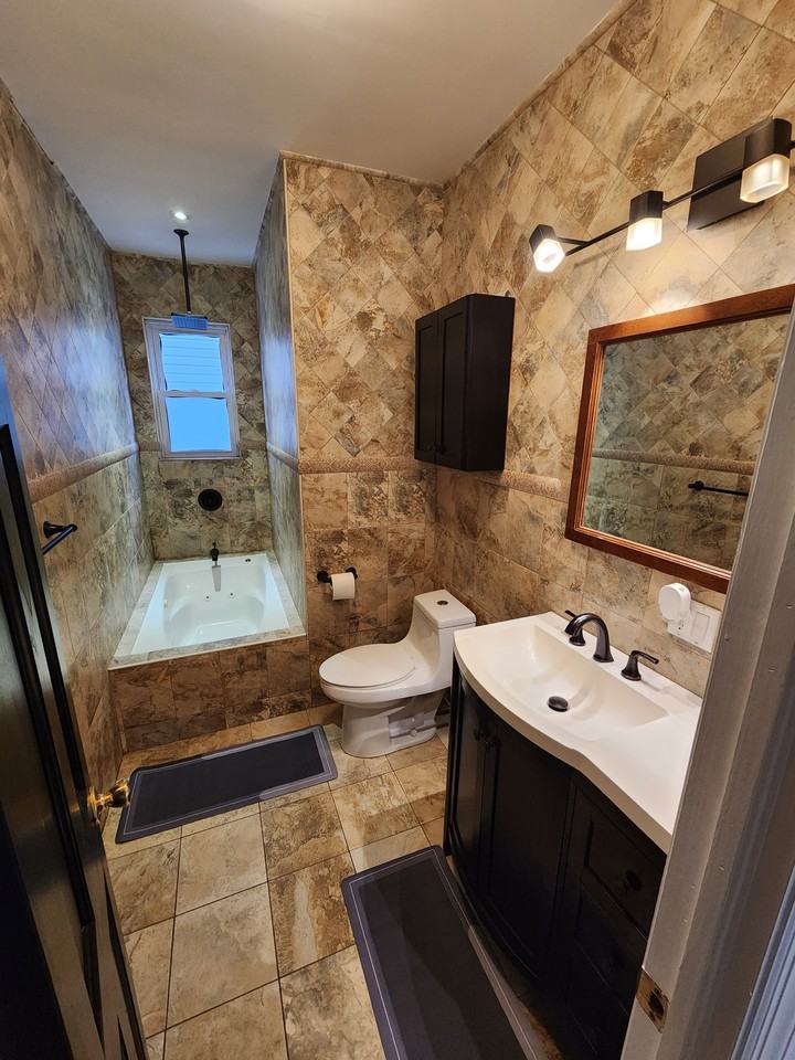 10730 89th St #1stFL - Photo 3 of 11
