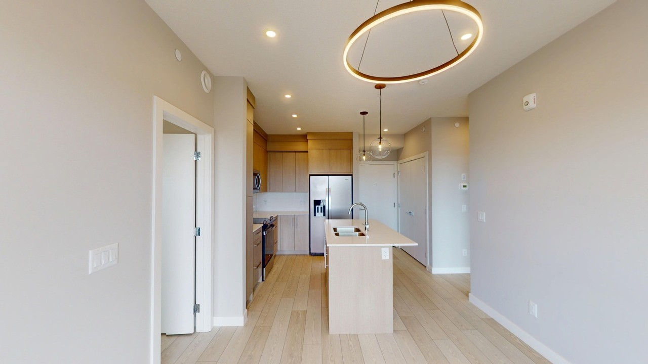 2205 - 265 Wolf Willow Boulevard Southeast - Photo 3 of 27