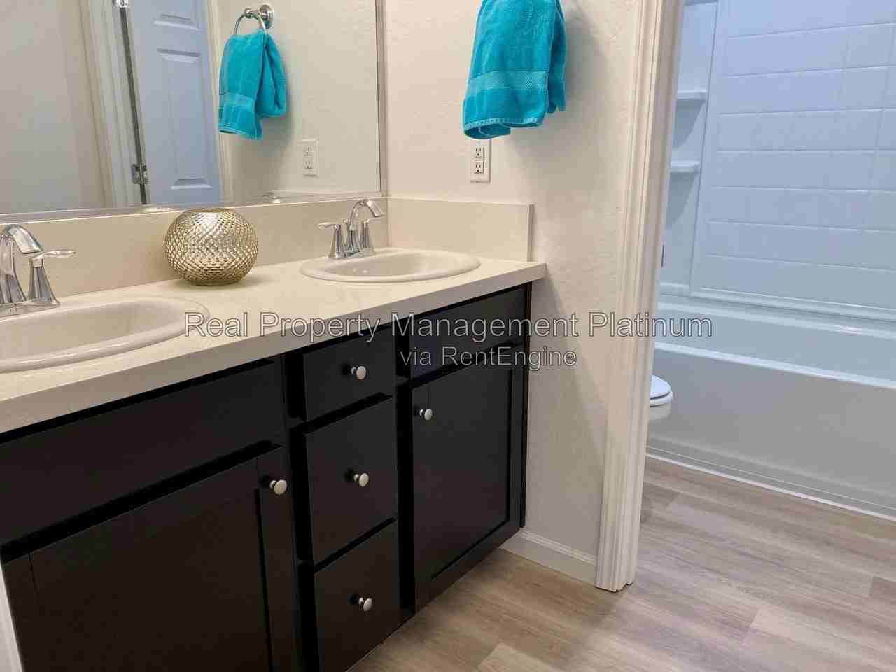 6696 E Vassar Ave - Photo 7 of 14