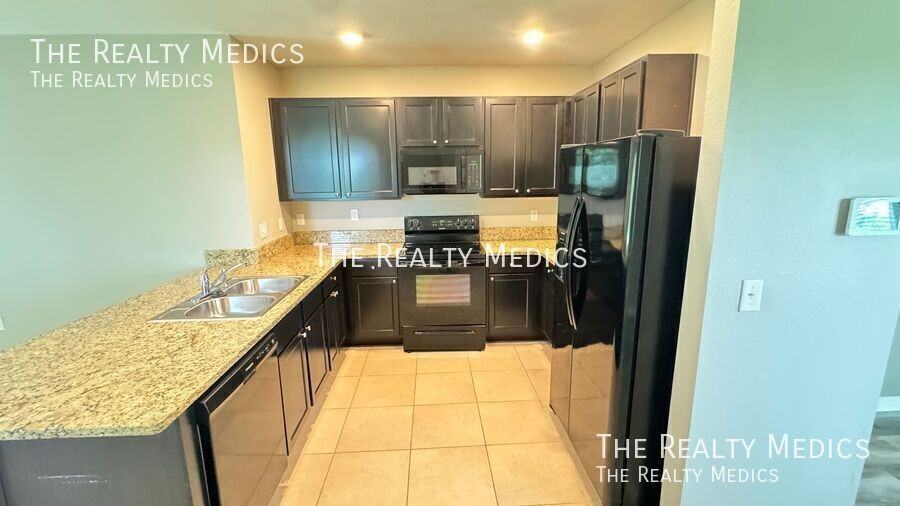 10906 Carlton Fields Dr - Photo 4 of 43