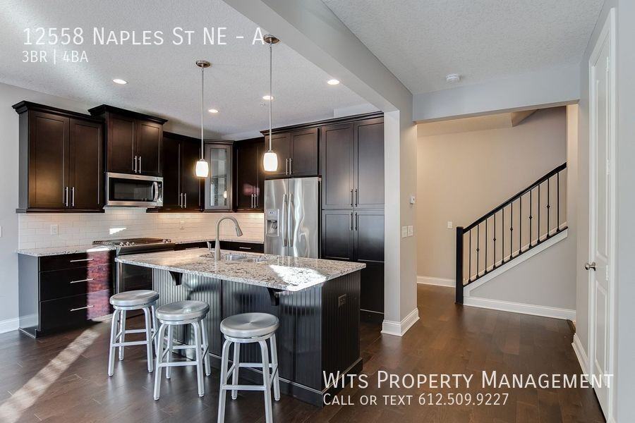 12558 Naples St Ne #A - Photo 4 of 28