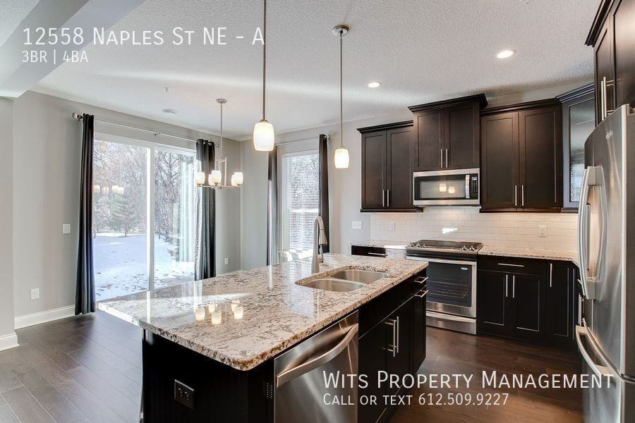 12558 Naples St Ne #A - Photo 5 of 28