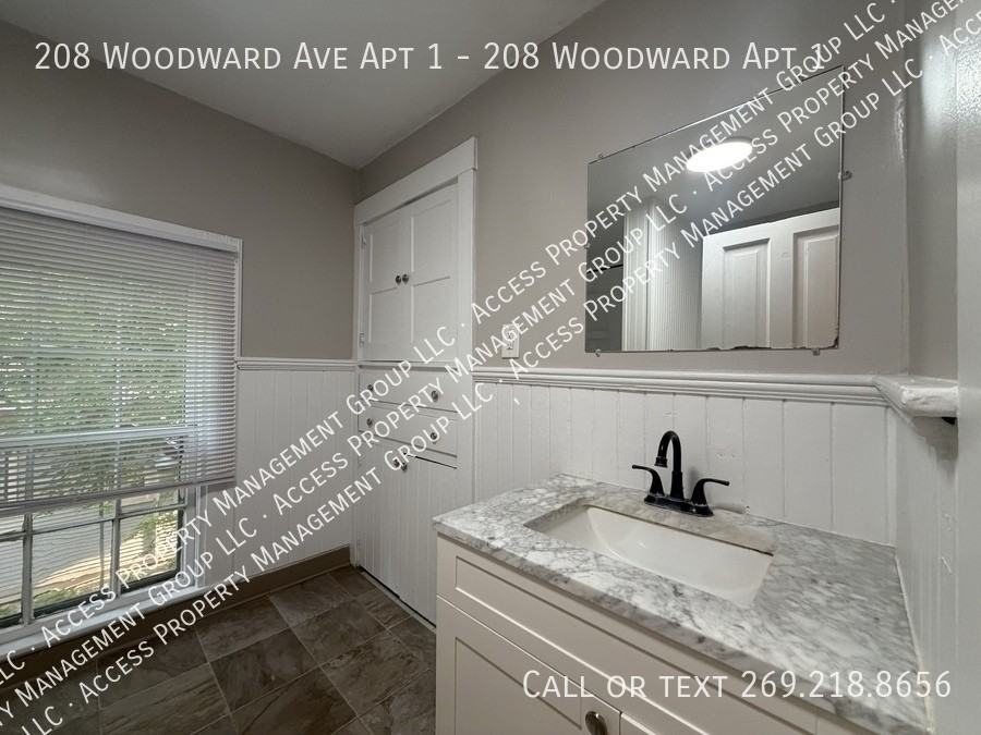 208 Woodward Ave Apt 1 - Photo 3 of 26